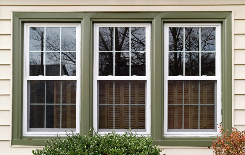 New Window and Door Installation with green trim